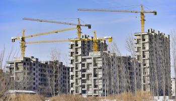 Commercial property block under construction in China (Costfoto/NurPhoto/Shutterstock)