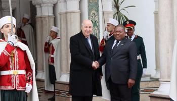 President Filipe Nyusi shakes Algerian President Abdelmadjid Tebboune’s hand after securing an agreement for military support, Algiers, March 1, 2024. (Xinhua/Shutterstock)
