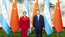 Honduran President Xiomara Castro and Chinese President Xi Jinping pose for photographs in Beijing, June 2023 (Chine Nouvelle/SIPA/Shutterstock)