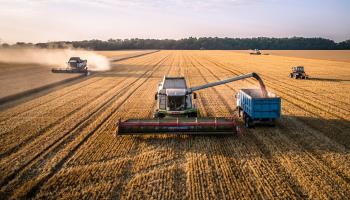 Harvester working in a wheat field, Krasnodar Territory (Shutterstock)