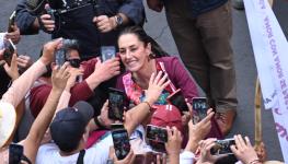 Sheinbaum poses for photographs with supporters at a rally in Mexico City. March 2024 (Marco Gonzalez/Eyepix Group/Shutterstock)