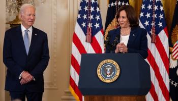 President Joe Biden (L) listens to Vice President Kamala Harris speak at a White House event, August 29, 2023 (Nathan Posner/Shutterstock)