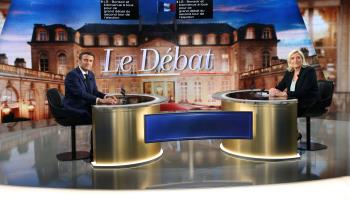 French President Emmanuel Macron (left) and National Rally leader Marine Le Pen (right) (Alain Robert/SIPA/Shutterstock)