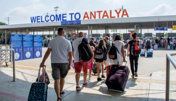Tourists arrive at Antalya airport (Shutterstock)