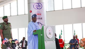 Nigerian President Bola Tinubu speaks at ceremony for Abuja’s metro rail system, June 2024 (Xinhua/Shutterstock)