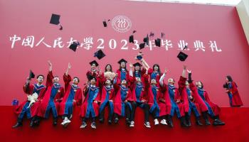 Renmin University graduates in Beijing throw their caps after the degree awarding ceremony (Wu Hao/EPA-EFE/Shutterstock)