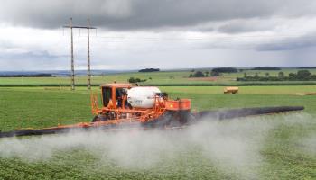 A soybean crop being sprayed with pesticide (Alf Ribeiro/Shutterstock)