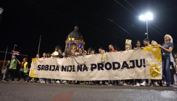 Protesters with a banner reading “Serbia is not for sale” marching in Belgrade against the Jadar mine, 13 April 2024 (Andrej Cukic/EPA-EFE/Shutterstock)


