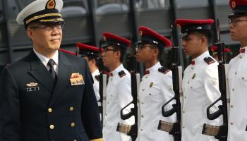 Chinese Defence Minister Dong Jun and Singaporean counterpart Ng Eng Hen review honour guards during a welcome ceremony in Singapore (How Hwee Young/EPA-EFE/Shutterstock)

