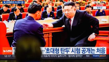 North Korean leader Kim Jong-un (right) speaks with Premier Kim Tok-hun during a Workers’ Party of Korea plenary session in Pyongyang (Kim Jae-Hwan/SOPA Images/Shutterstock)