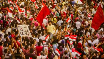 Demonstrations in Egypt, 2013 (MidoSemsem/Shutterstock)
