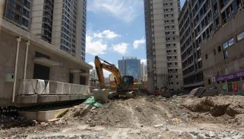 Construction of a residential complex in Shanghai, China (Ying Tang/NurPhoto/Shutterstock)