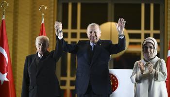 President Recep Tayyip Erdogan with his wife and MHP leader Devlet Bahceli after his presidential election victory, 28 May 2023 (Turkish President Press Office/UPI/Shutterstock)