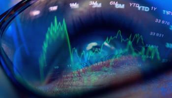 Dow Jones index graphs are seen reflected in a man's glasses (RESTRICTED TO EDITORIAL USE
Mandatory Credit: Photo by Jaap Arriens/NurPhoto/Shutterstock)