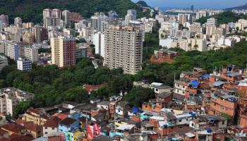 A shanty town overlooking apartment blocks in Rio de Janeiro (Sunny Celeste/imageBROKER/Shutterstock)