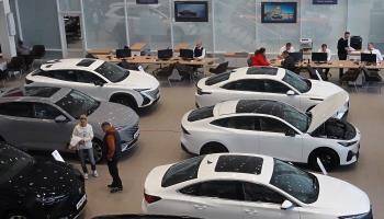 People visiting a Chinese car brand Changan store in Russia (Maxim Shipenkov/EPA-EFE/Shutterstock)