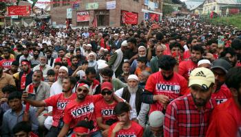 Supporters of the Jammu & Kashmir National Conference party at an election campaign rally (Nisar Ul Haq Allaie/Pacific Press/Shutterstock)