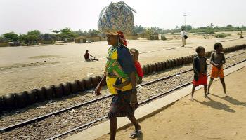 Woman walking along the Benguela railway, now part of the Lobito Corridor, June 2004 (Kim Ludbrook/EPA/Shutterstock)