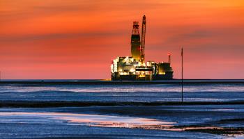 Oil rig at sunset, Germany (Olaf Doering/imageBROKER/Shutterstock)