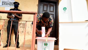 A woman casts a vote during the 2020 Edo State governorship election (PIUS UTOMI EKPEI/AFP via Getty Images)