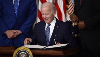 President Biden signs the Inflation Reduction Act, August 16, 2022 (Bonnie Cash/UPI/Shutterstock)