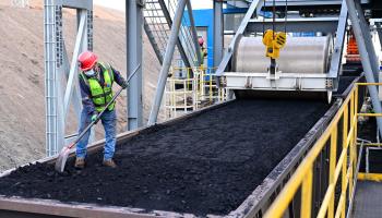 A worker at the Zhundong open-pit coal mine of Xinjiang Zhundong Energy Co., Ltd. of China Energy Group (Xinhua/Shutterstock)