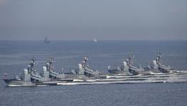 Russia's Pacific Fleet warships parade off the port city of Vladivostok during Navy Day celebrations (Pavel Korolyov/AFP/Getty Images)