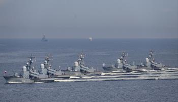 Russia's Pacific Fleet warships parade off the port city of Vladivostok during Navy Day celebrations (Pavel Korolyov/AFP/Getty Images)