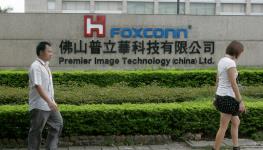 Chinese workers on their way to a Foxconn factory in Foshan, Guangdong province (STR/AFP/Getty Images)

