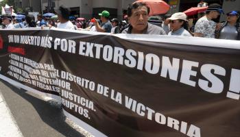 Transport workers’ protest over extortion by local mafias (Cris Bouroncle/AFP/Getty Images)