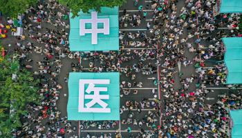 People visiting a traditional Chinese medicine night market at a hospital in Shenyang, Liaoning province (STR/AFP/Getty Images)

