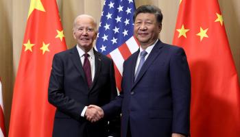 Chinese President Xi Jinping (right) shakes hands with his US counterpart Joe Biden (left) on the sidelines of the APEC summit in Peru (Leah Millis/POOL/AFP/Getty Images)

