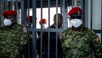 Opposition activist Kizza Besigye is charged in a Kampala military court, November 20, 2024 (Badru Katumba/AFP/Getty Images)

