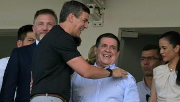 Paraguayan President Santiago Pena and former President Horacio Cartes (Juan Mabromata/AFP via Getty Images)