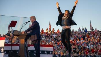 Elon Musk jumps on stage as he joins Donald Trump during a campaign rally (Jim Watson/AFP/Getty Images)