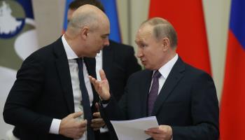 Russian President Vladimir Putin (right) and Finance Minister Anton Siluanov (Mikhail Svetlov/Getty Images)