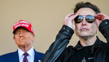 Donald Trump (in hat) and Elon Musk, seen together last month  (Brandon Bell/Getty Images)