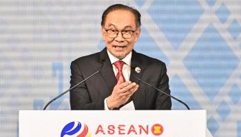 Prime Minister Anwar Ibrahim speaking at the closing ceremony of the ASEAN summits in Laos in October (Tang Chhin Sothy/AFP/Getty Images)

