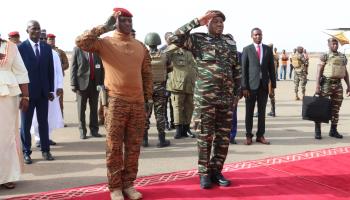 Military rulers of Burkina Faso, Ibrahim Traore (left), and Niger, Abdourahamane Tiani (right) salute together in Niamey for the first AES heads of state summit, September 2024  (AFP/Getty Images)