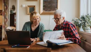 Senior couple using laptop at home (Johner Images/Johner RF/Getty Images)