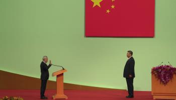 China’s President Xi Jinping (right) swears in new Macau Chief Executive Sam Hou-fai (left) (Justin Chan/POOL/AFP/Getty Images) 