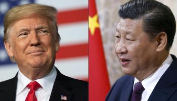 Chinese President Xi Jinping (right) and US President Donald Trump (left) (JIM WATSON and PETER KLAUNZER/AFP/POOL/Getty Images)