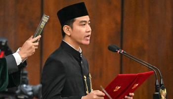 Vice President Gibran Rakabuming Raka taking his oath of office last October (Bay Ismoyo/AFP/Getty Images)