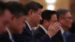 China’s President Xi Jinping (centre) speaks to senior EU officials during the 25th EU-China Summit in Beijing (Andres Martinez Casares/AFP/POOL/Getty Images)  
